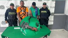 Hombres capturados con un fusil en el sur de Barranquilla.