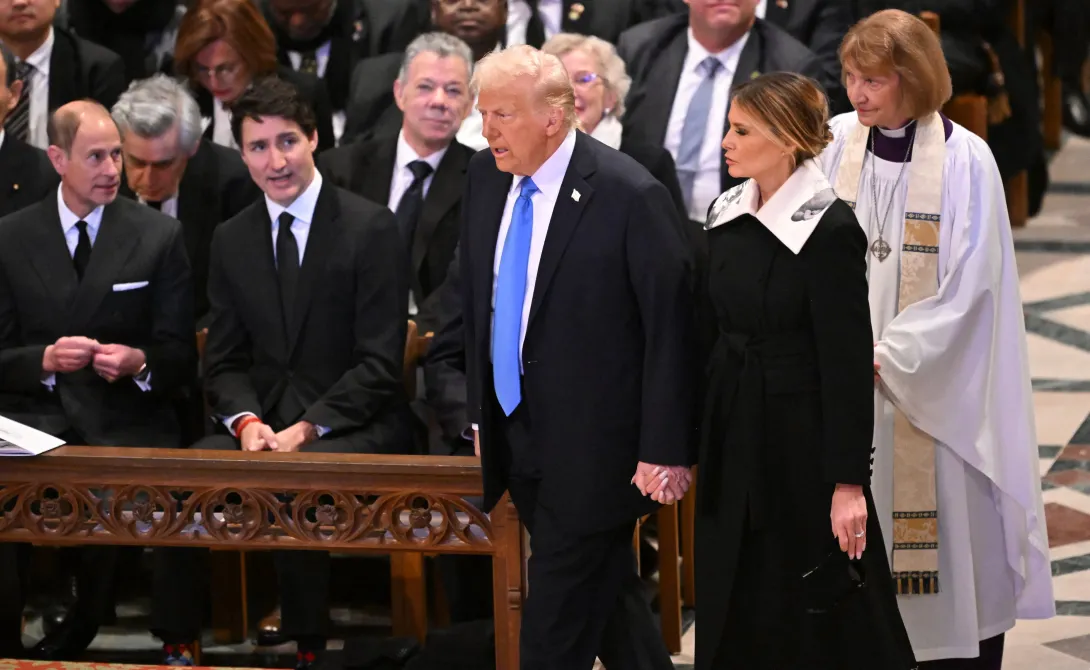 US President-elect Donald Trump and former First Lady Melania Trump arrive to attend the State Funeral Service for former US President Jimmy Carter at the Washington National Cathedral in Washington, DC, on January 9, 2025. (Photo by Mandel NGAN / AFP)